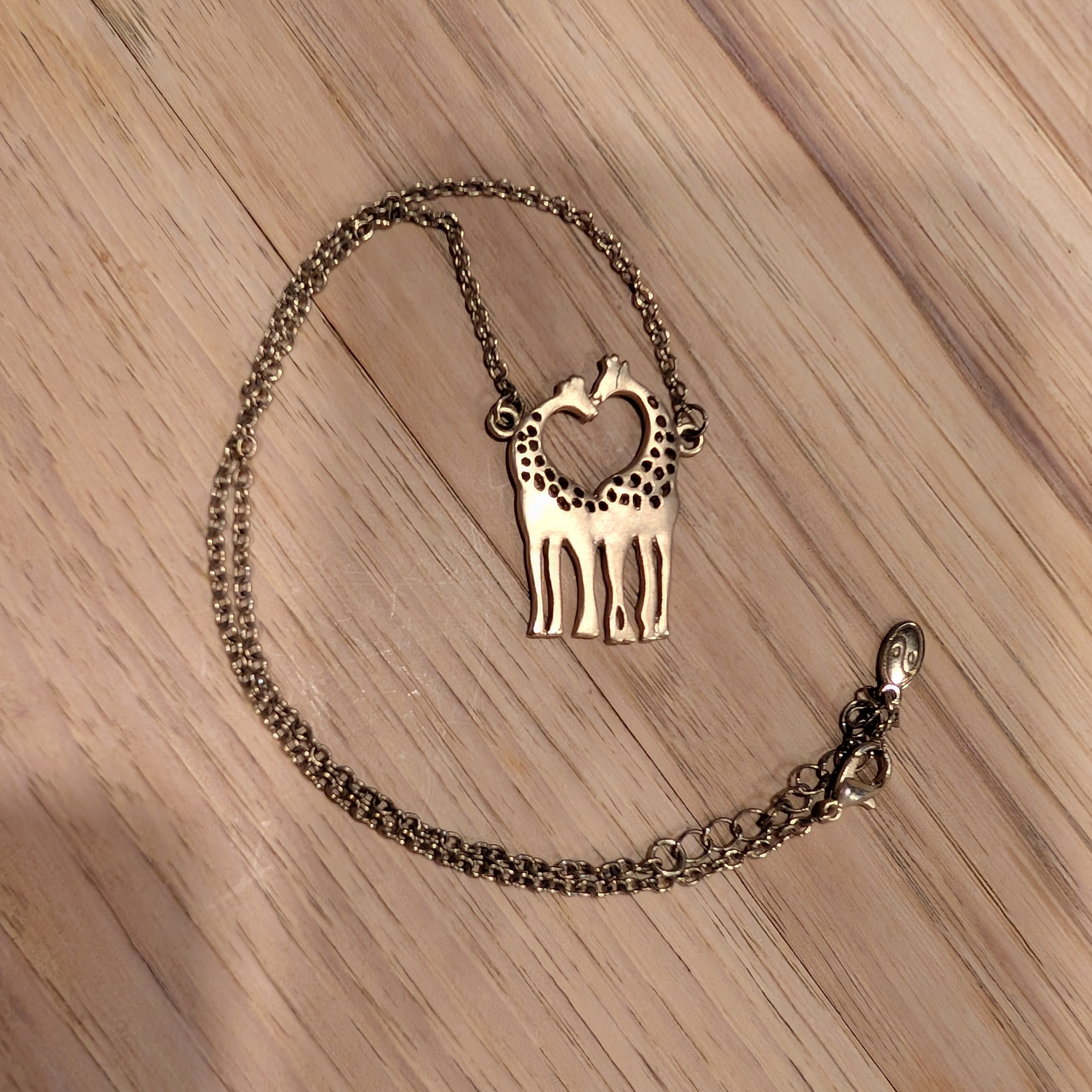 Gold Giraffe Pendant Necklace And Earrings